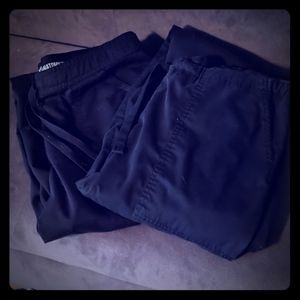 2 black scrub pants